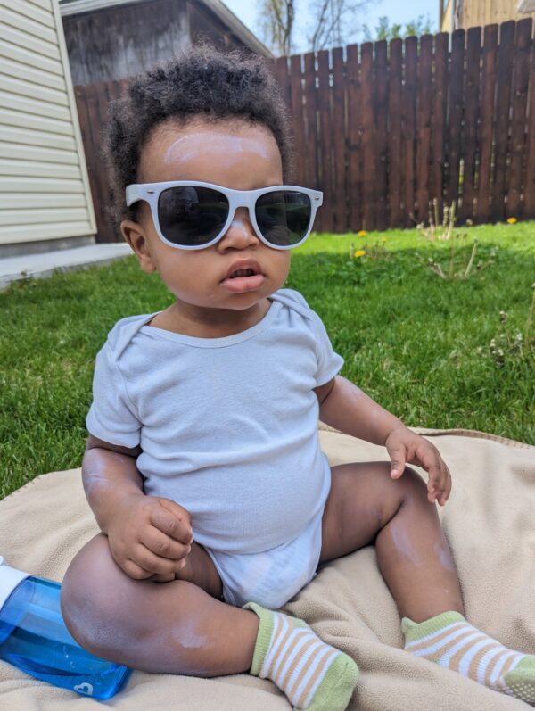 Baby Mattias in sunglasses.