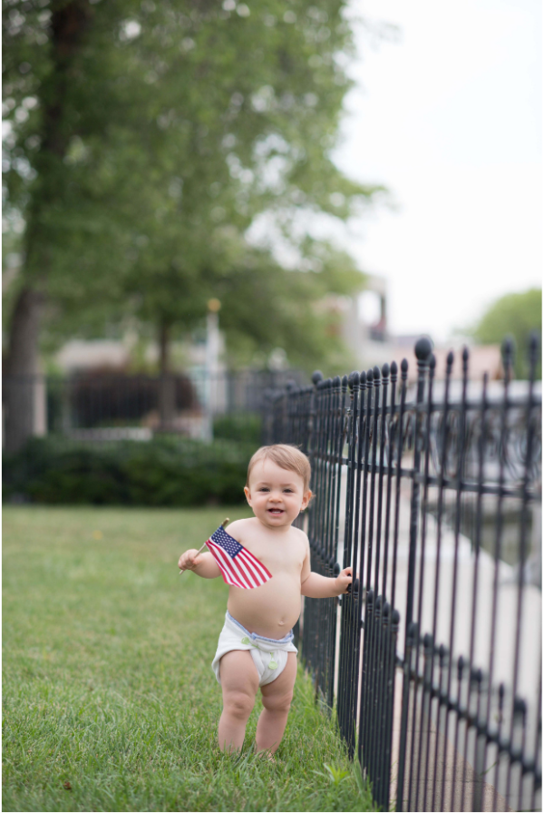 baby in prefold diaper outside